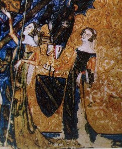 Donne in surcot colorato e decorato